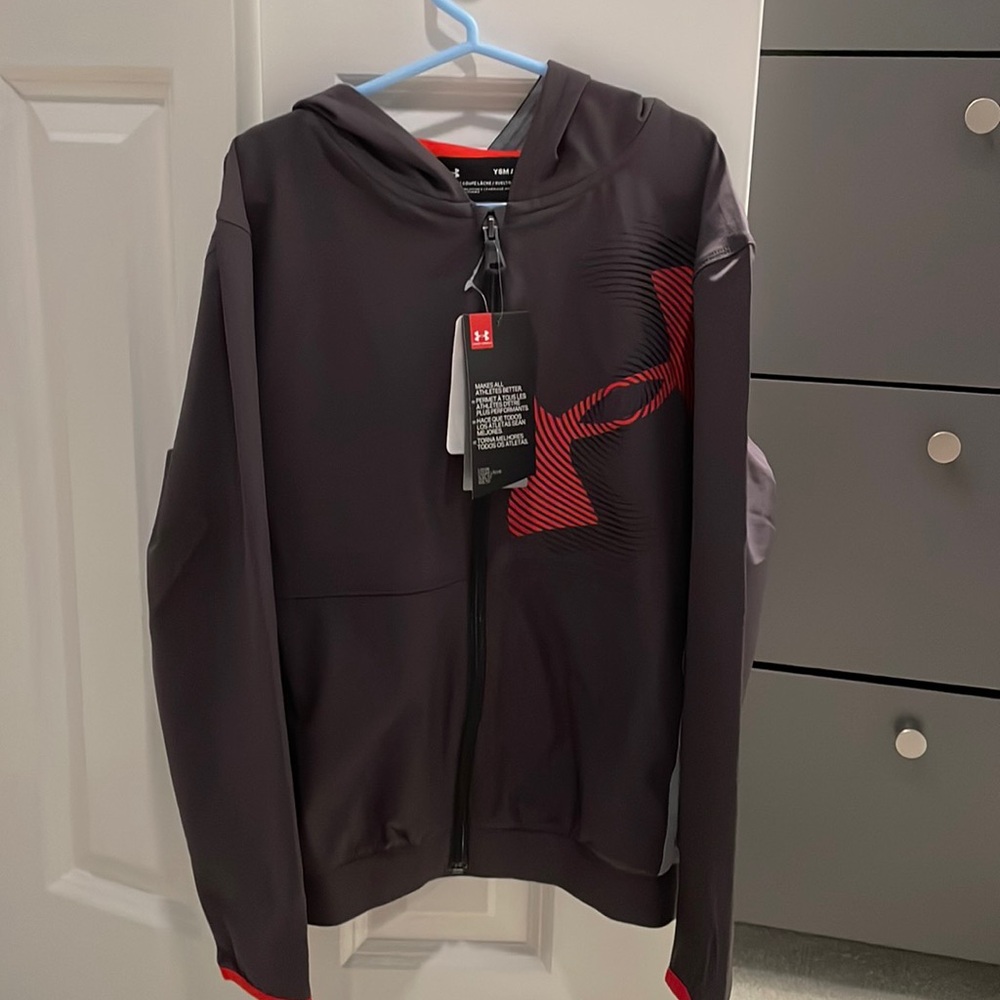 Under Armour size small lightweight  jacket never been worn with tags